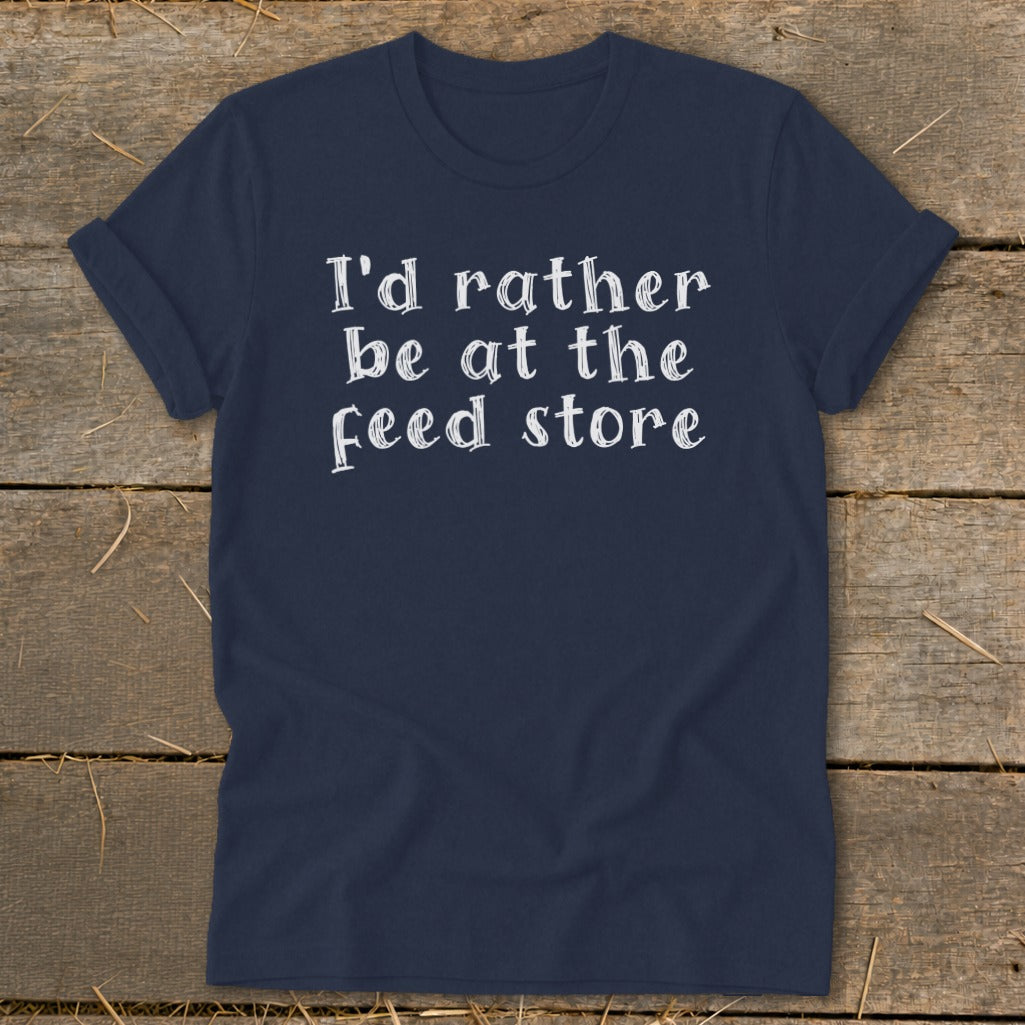 Navy t-shirt with white text: "I'd rather be at the feed store".