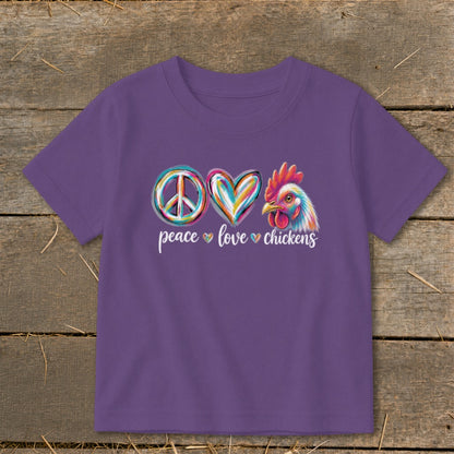 Purple t-shirt with peace, heart, and chicken graphic, text reads "peace love chickens".