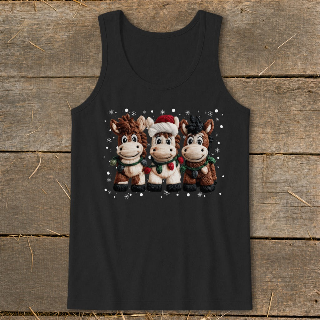 Three cartoon horses in festive winter clothing and Christmas lights on a black tank top.