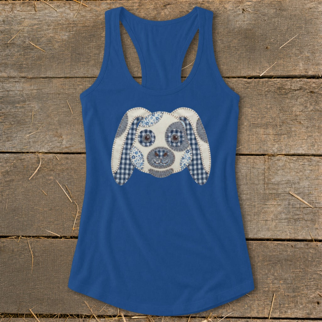 Blue tank top with a patchwork dog face graphic on the front.