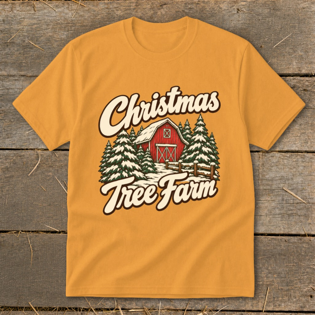 T-shirt graphic with "Christmas Tree Farm" text and a red barn surrounded by snow-covered trees.