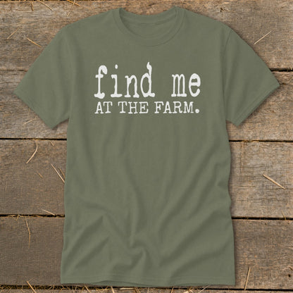 Olive green t-shirt with white text "find me AT THE FARM."