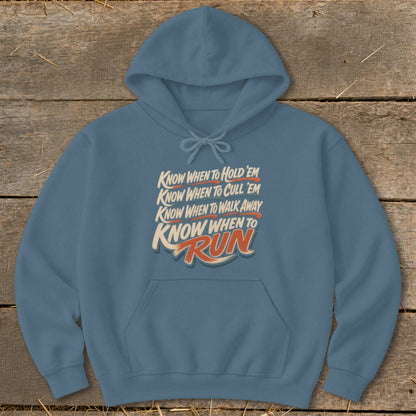 Blue hoodie with text "Know When to Hold 'em, Know When to Cull 'em, Know When to Walk Away, Know When to Run".
