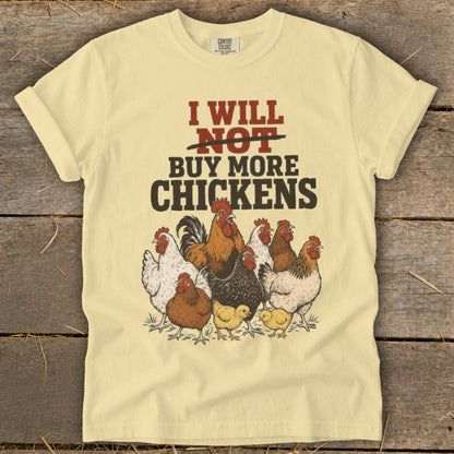 Light yellow t-shirt with "I Will NOT Buy More CHICKENS" text and a group of chickens.