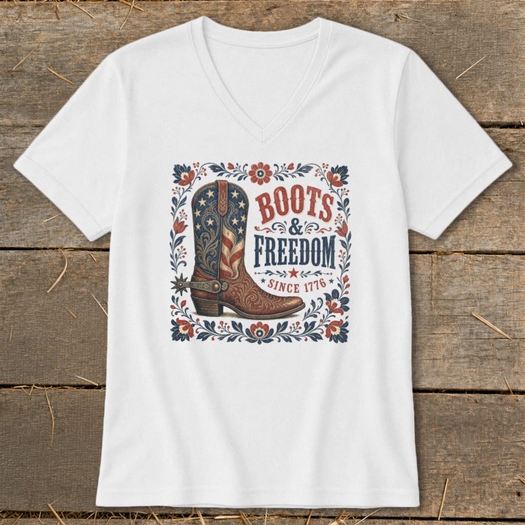 White t-shirt with a graphic of a cowboy boot and text: Boots & Freedom Since 1776.