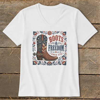 White t-shirt with a graphic of a cowboy boot and text: Boots & Freedom Since 1776.