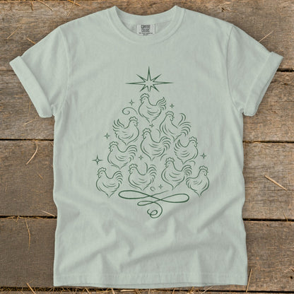 Light green t-shirt with a Christmas tree formed from line-drawn chickens and a star.
