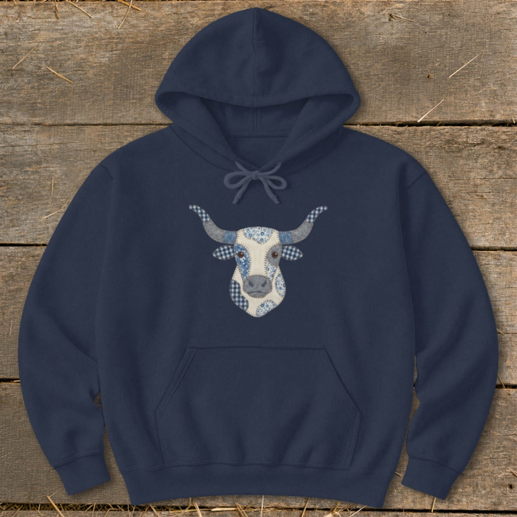 Navy hoodie with a patchwork bull head design on the front.