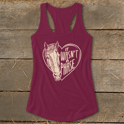 Maroon tank top with heart graphic and horse head, "It Wasn't A Phase" text.