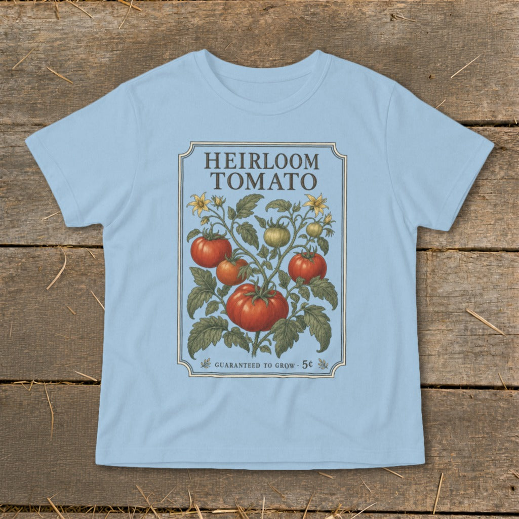 Light blue t-shirt with "Heirloom Tomato" text and tomato plant illustration.
