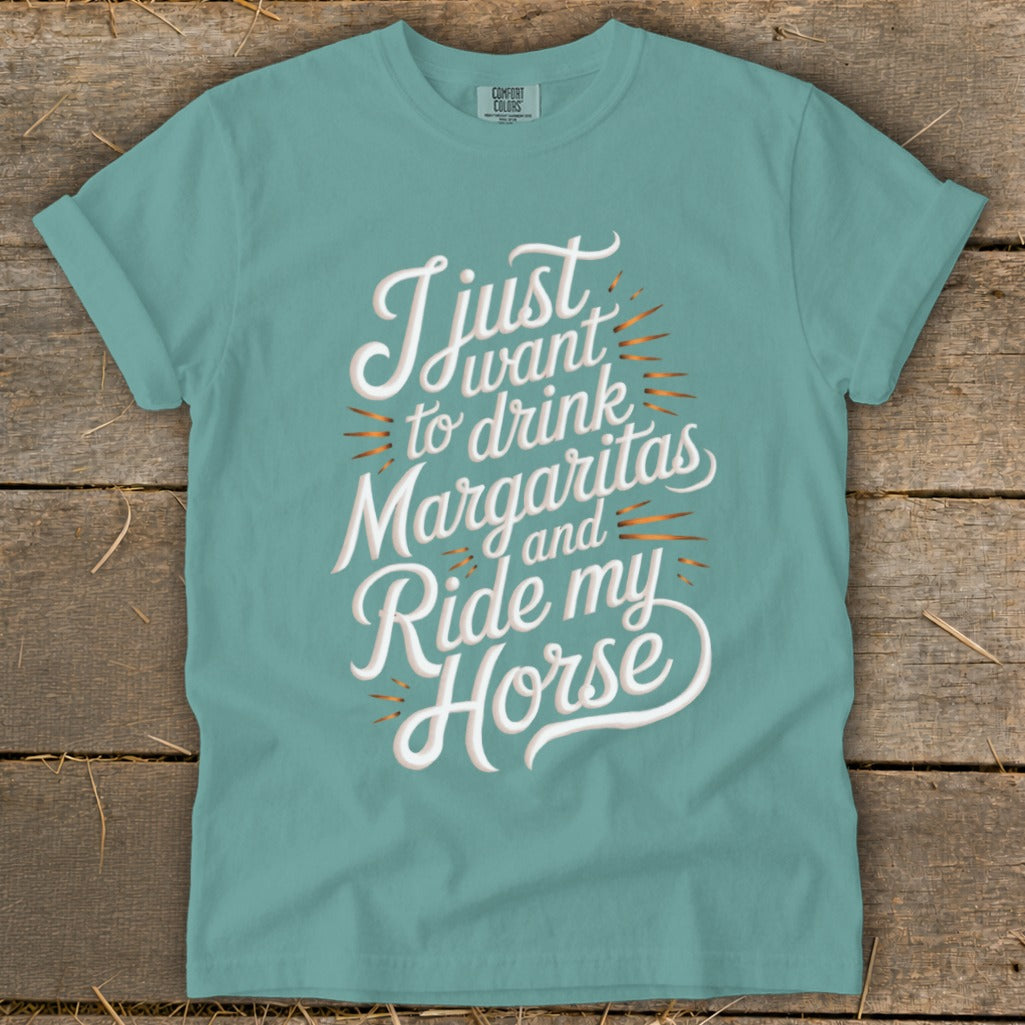 Teal t-shirt with "I just want to drink Margaritas and Ride my Horse" graphic.