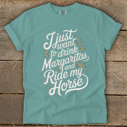 Teal t-shirt with "I just want to drink Margaritas and Ride my Horse" graphic.