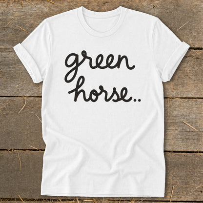 White t-shirt with "green horse.." in black cursive text.