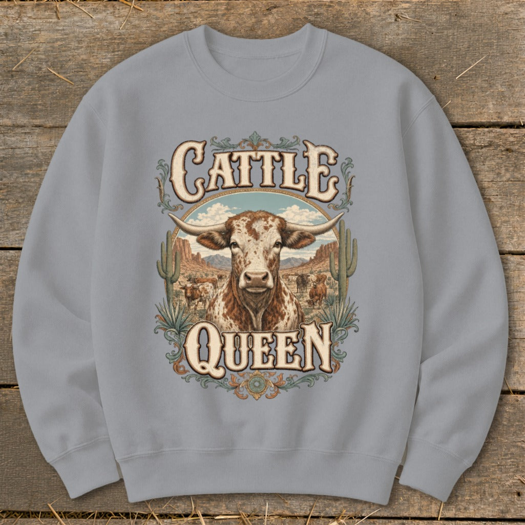 Crewneck sweatshirt with "Cattle Queen" text and a longhorn steer in desert landscape.