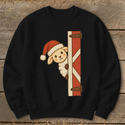 Black sweatshirt with a cartoon sheep wearing a Santa hat peeking from behind a barn door.