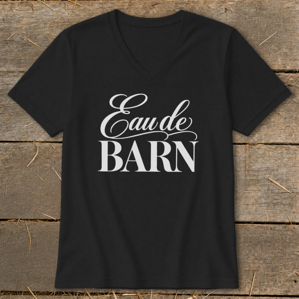 Black v-neck t-shirt with white "Eau de BARN" text across the chest.