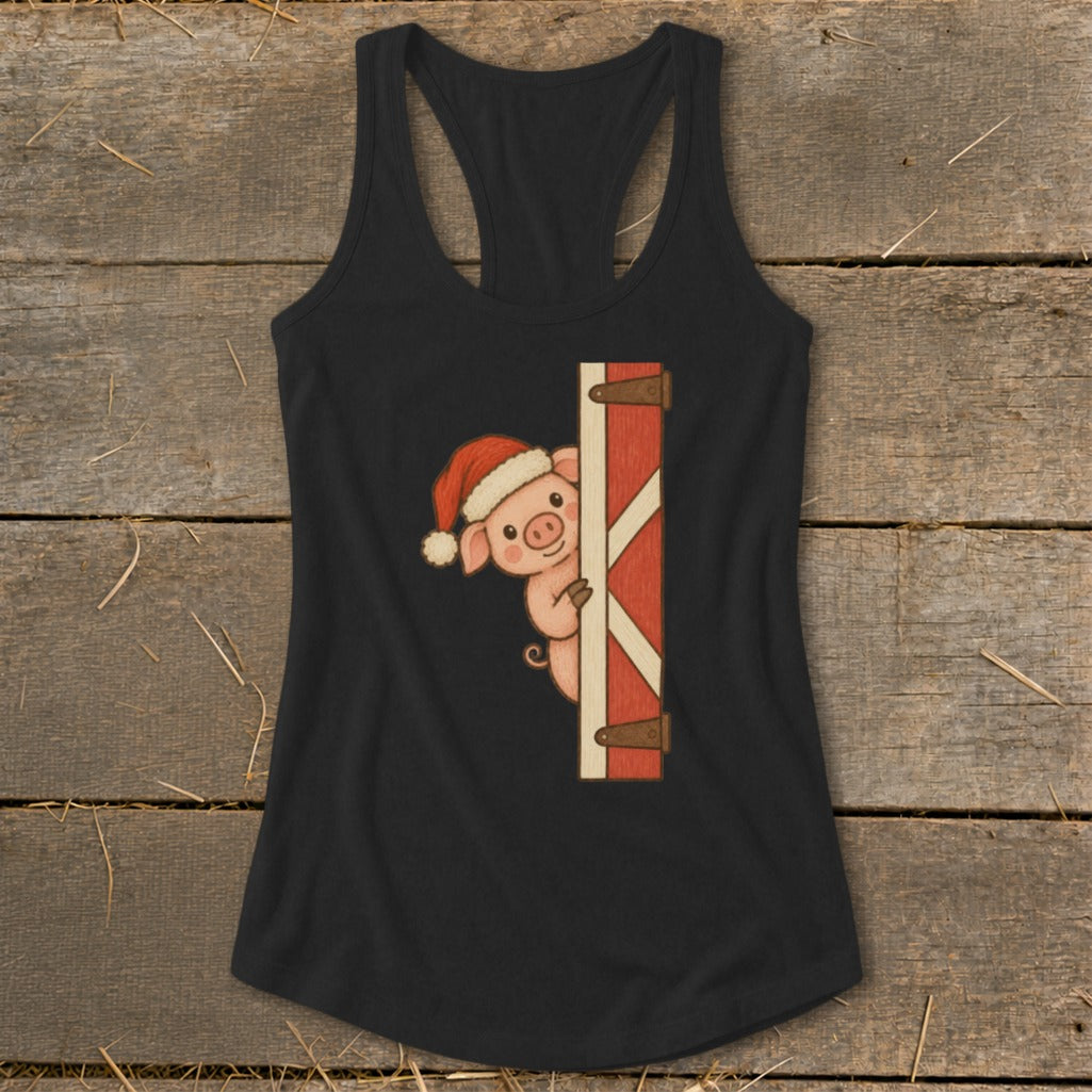 Black tank top with a cartoon pig wearing a Santa hat peeking from a barn door.