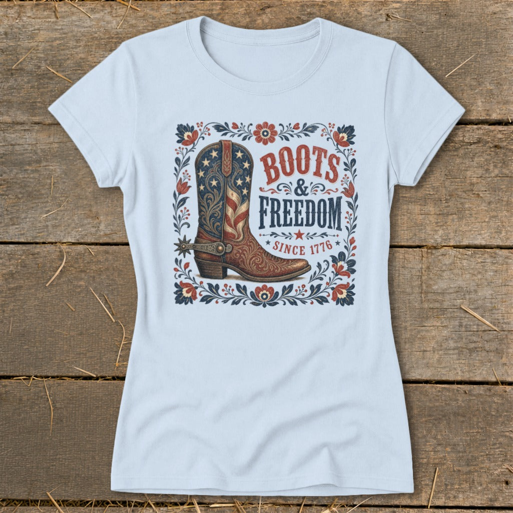 Light blue t-shirt with "Boots & Freedom Since 1776" and cowboy boot graphic.
