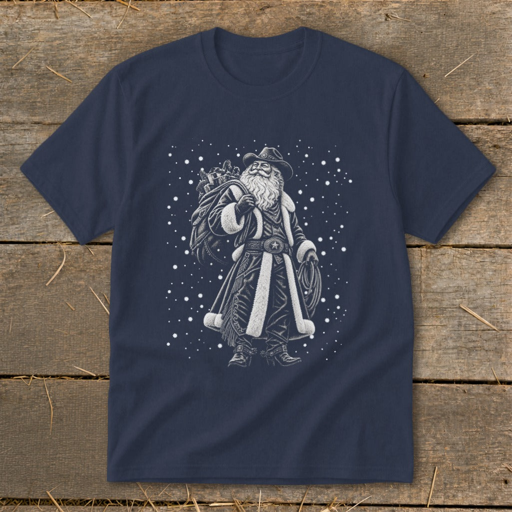 Navy t-shirt with a cowboy Santa Claus graphic carrying a sack of gifts and a lasso.