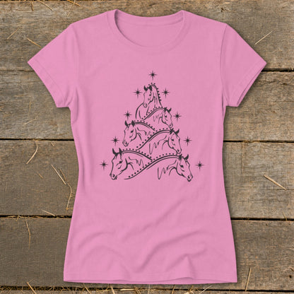 Pink t-shirt with a Christmas tree made of horse heads and stars.