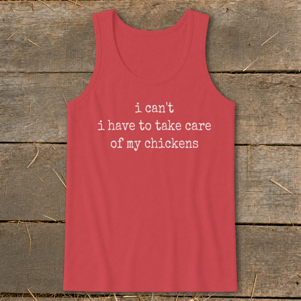Coral tank top with white text "i can't i have to take care of my chickens".