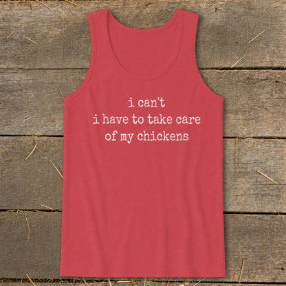 Coral tank top with white text "i can't i have to take care of my chickens".