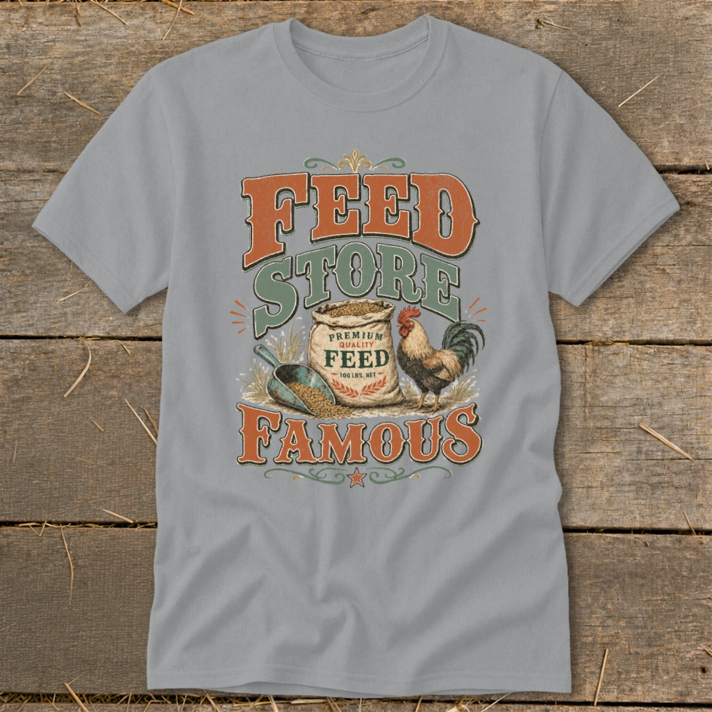"Feed Store Famous" graphic with a rooster, bag of feed, and scoop on a gray t-shirt.