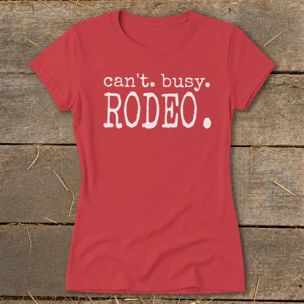 Red t-shirt with white text that reads "can't. busy. RODEO."