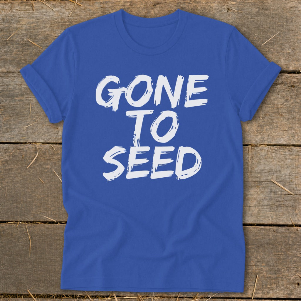Blue t-shirt with white text that reads "GONE TO SEED".
