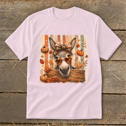 Donkey with heart sunglasses, plaid bow, and fall leaves on striped background.
