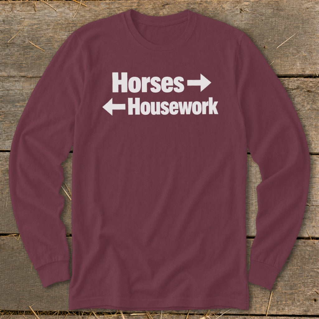 Maroon long-sleeved t-shirt with white text reading "Horses" and "Housework" with directional arrows.