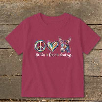 Maroon t-shirt with "peace love donkeys" text, peace sign, heart, and donkey graphic.