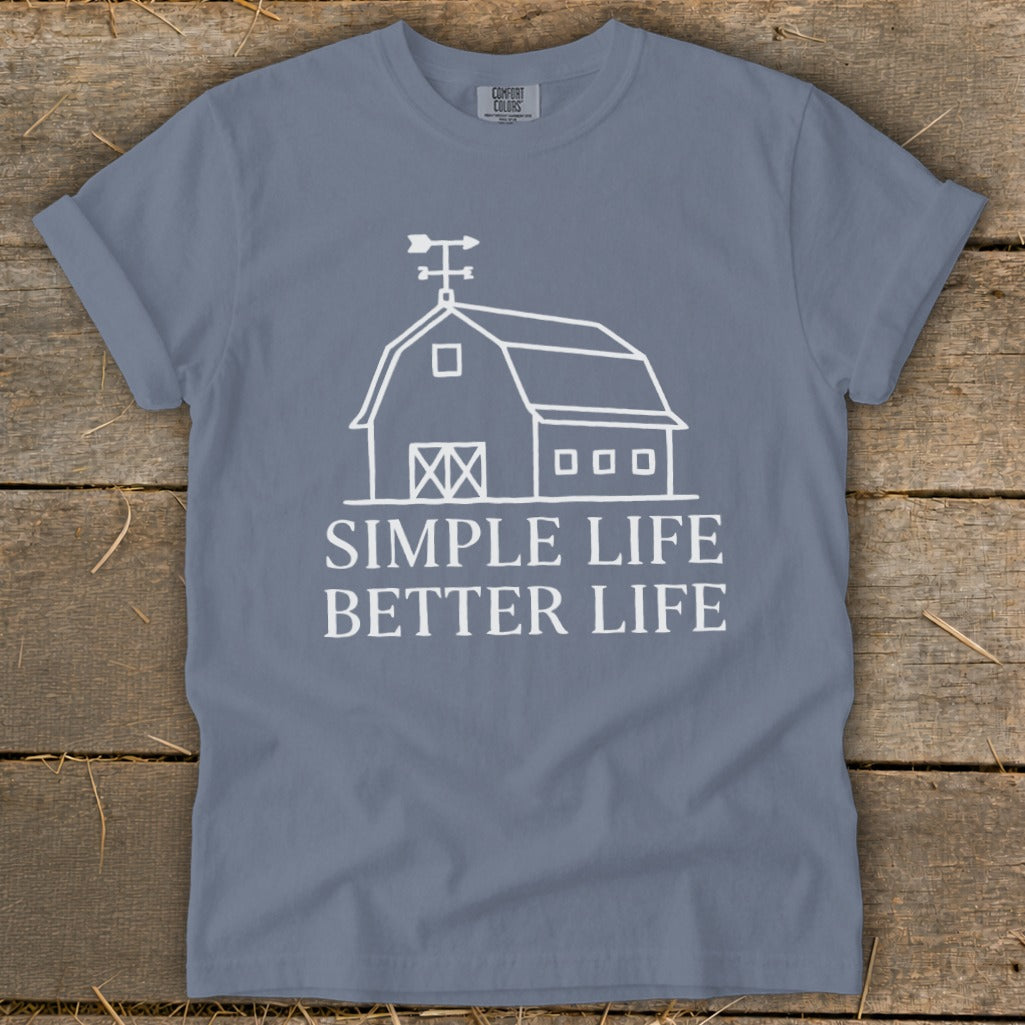 Blue t-shirt with white barn graphic and text "SIMPLE LIFE BETTER LIFE".