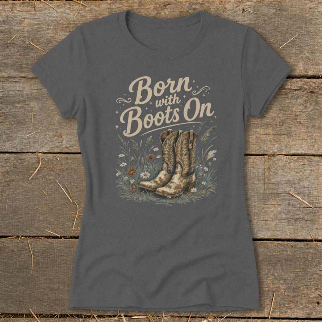 T-shirt with "Born with Boots On" text and cowboy boot graphic.