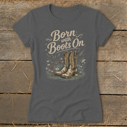 T-shirt with "Born with Boots On" text and cowboy boot graphic.