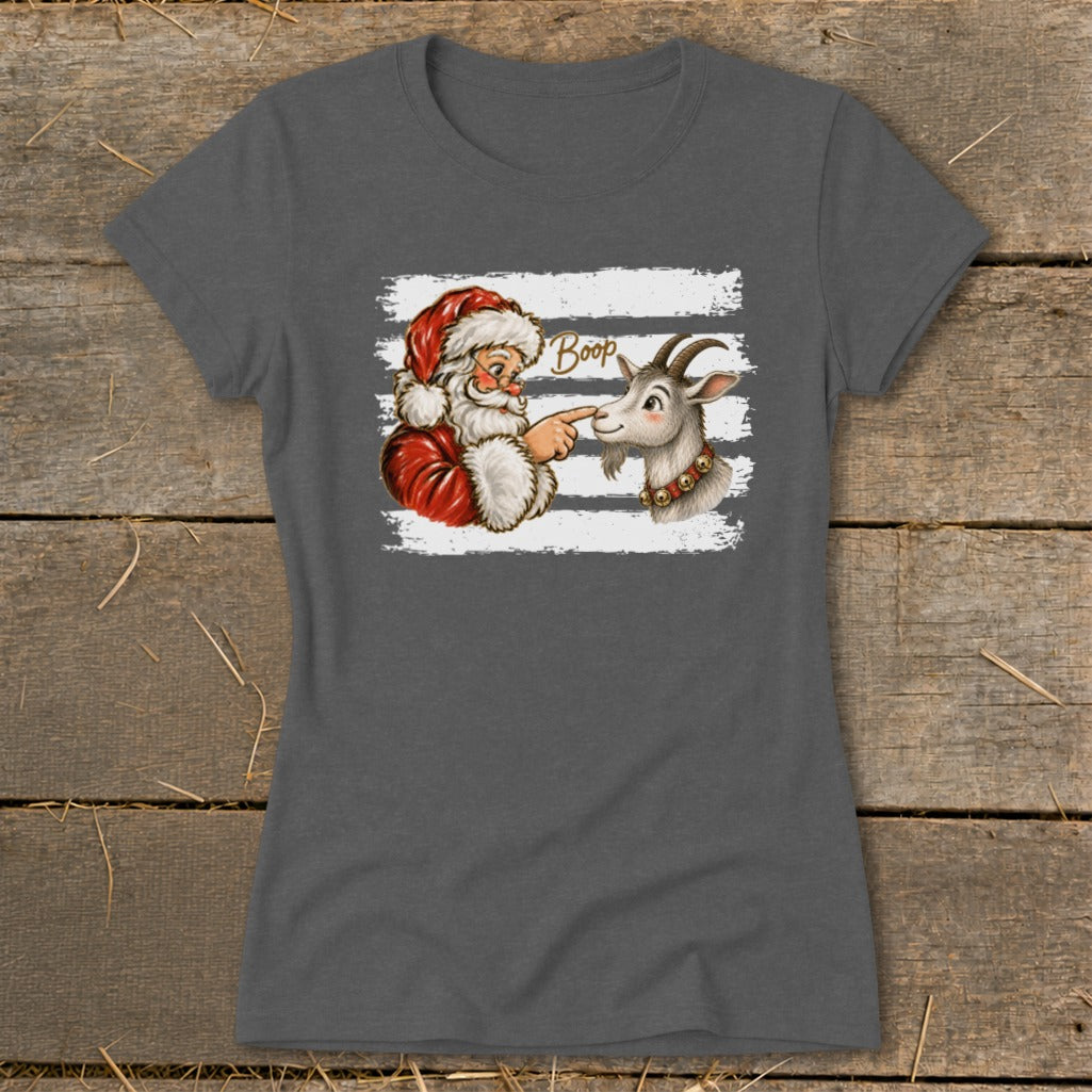 Santa booping a goat on the nose with the word "Boop"