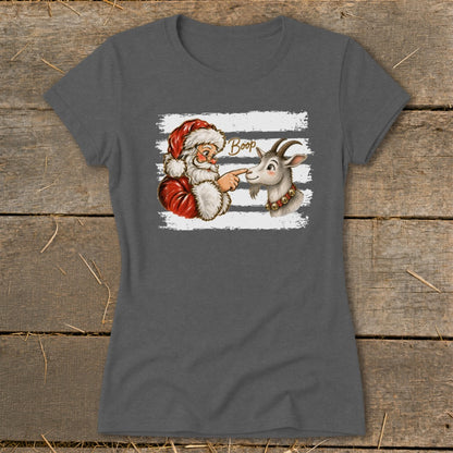 Santa booping a goat on the nose with the word "Boop"