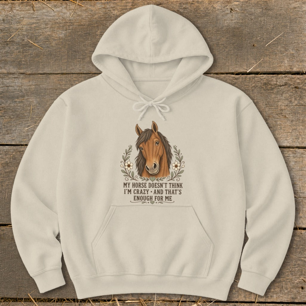 Cream hoodie with horse graphic and text: "My horse doesn't think I'm crazy and that's enough for me."