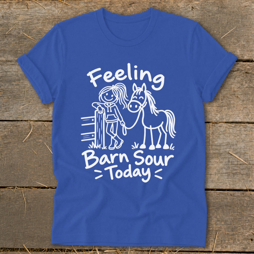 Blue t-shirt with white text and drawing of a girl with a horse.