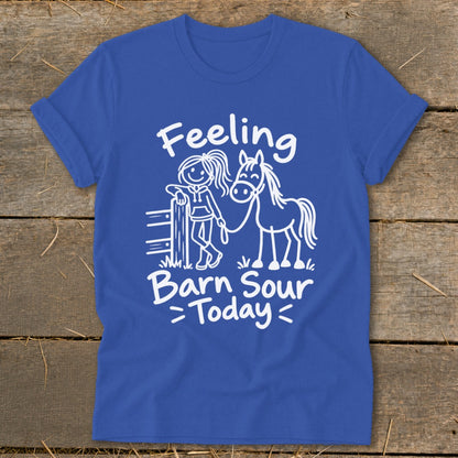 Blue t-shirt with white text and drawing of a girl with a horse.