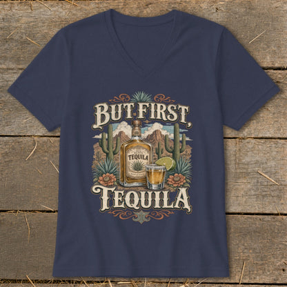 Navy t-shirt with "But First, Tequila" graphic featuring a desert scene, tequila bottle, and shot glass.