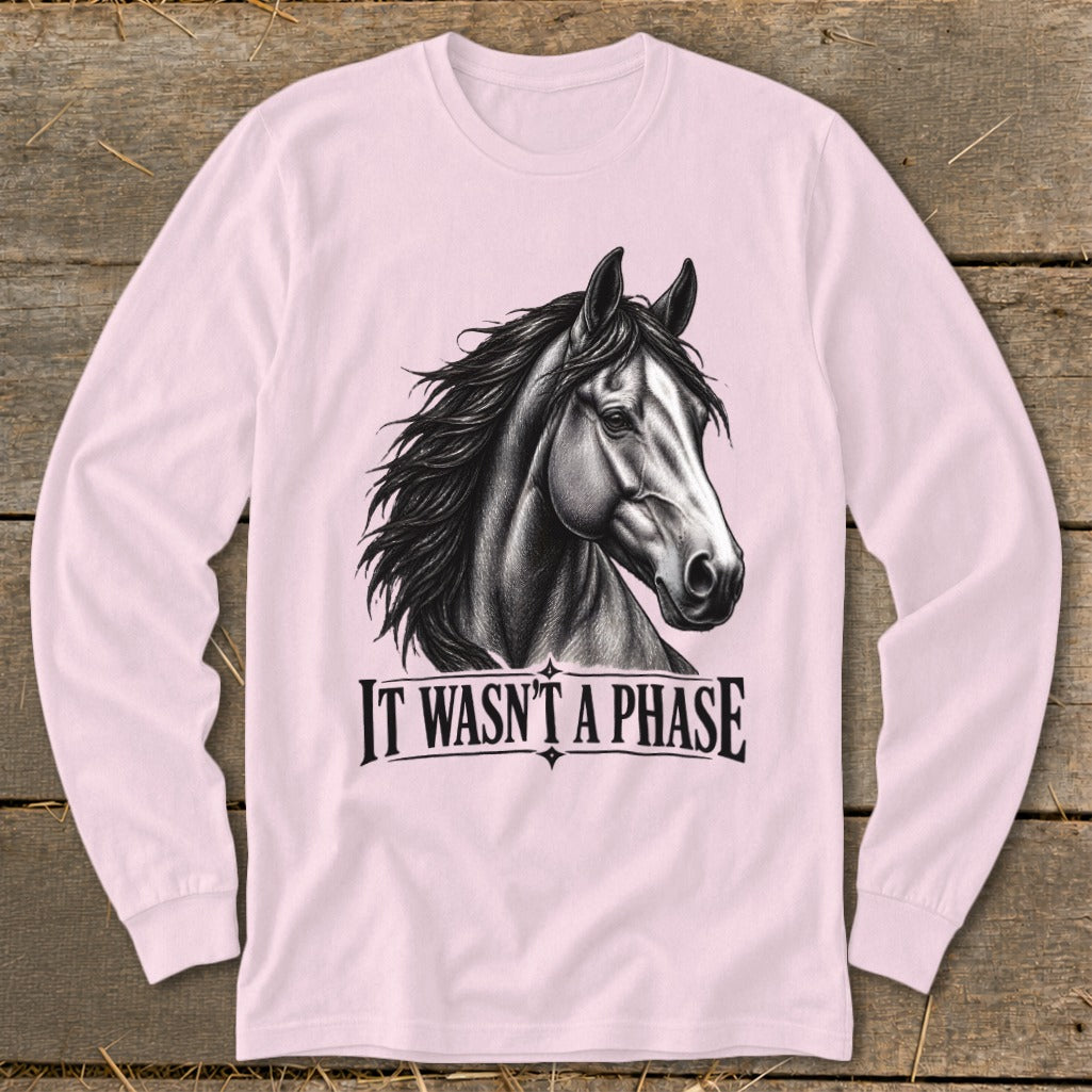 Pink long sleeve shirt with a sketch of a horse and text "IT WASN'T A PHASE".