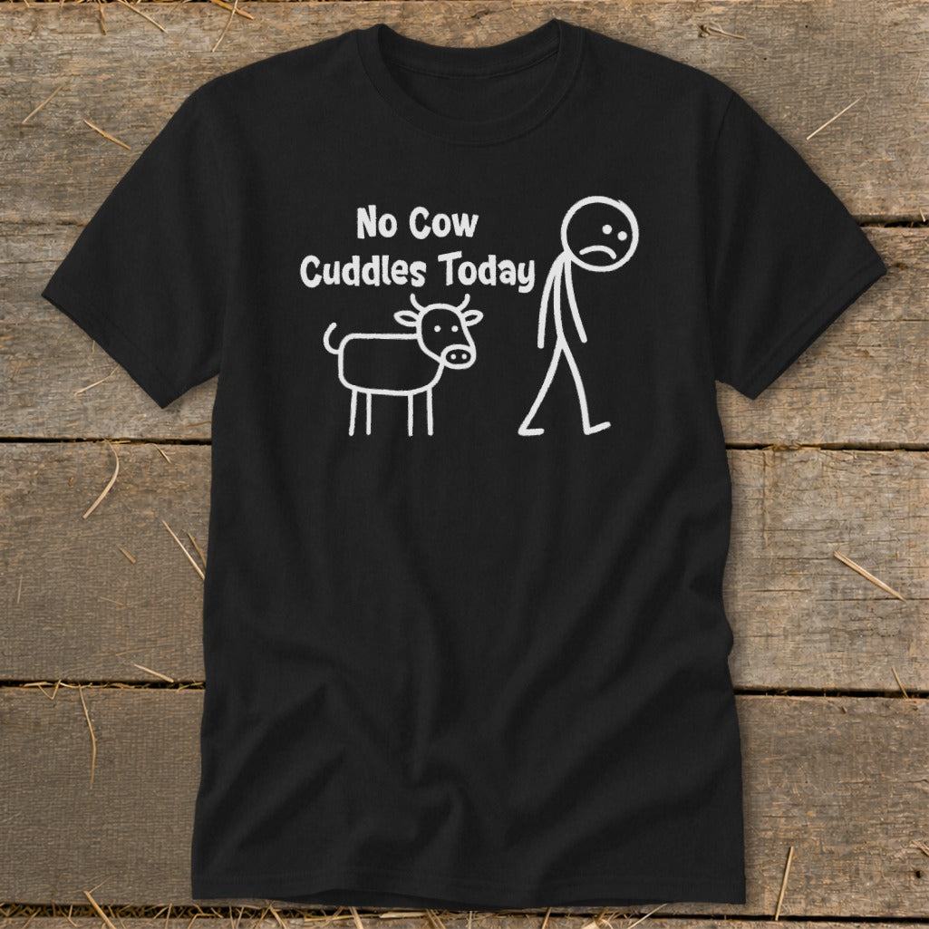 Black t-shirt with white text and line art of a sad stick figure and a cow.