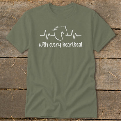 Olive green t-shirt with white horse heartbeat graphic and "with every heartbeat" text.