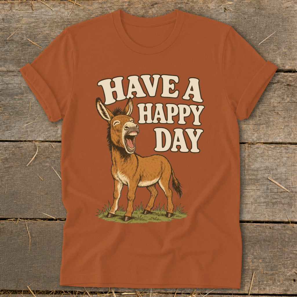 Orange t-shirt with a cartoon donkey and text "HAVE A HAPPY DAY".