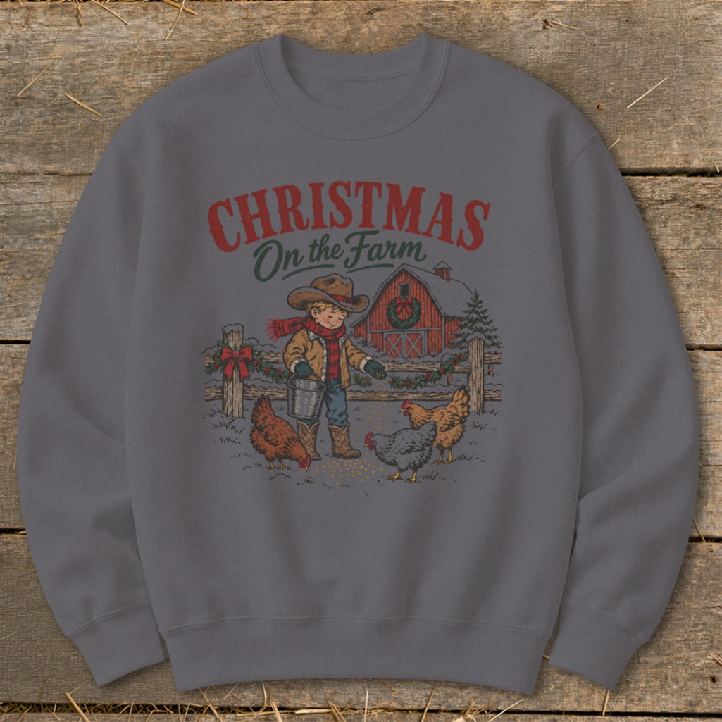 Christmas on the Farm graphic of a boy feeding chickens by a red barn.