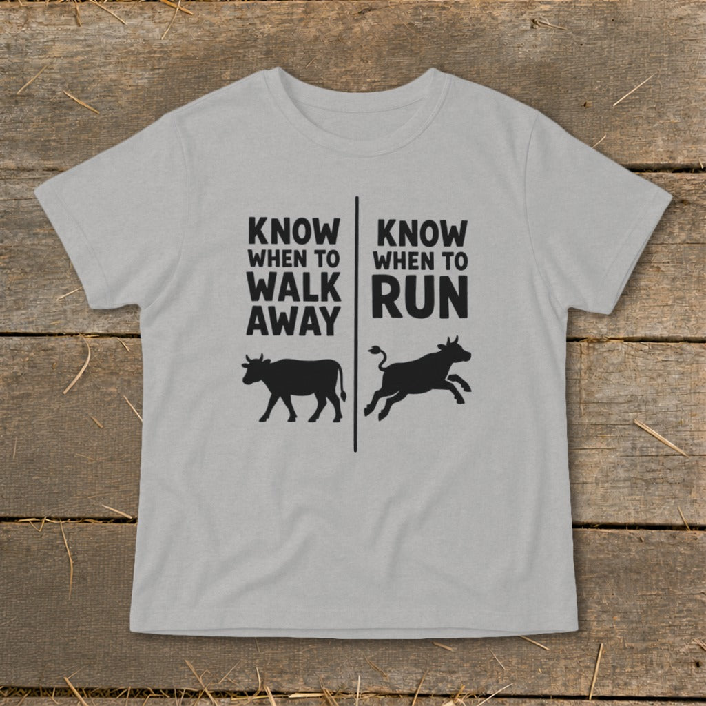 Grey t-shirt with text "Know When to Walk Away" and "Know When to Run" with cow graphics.