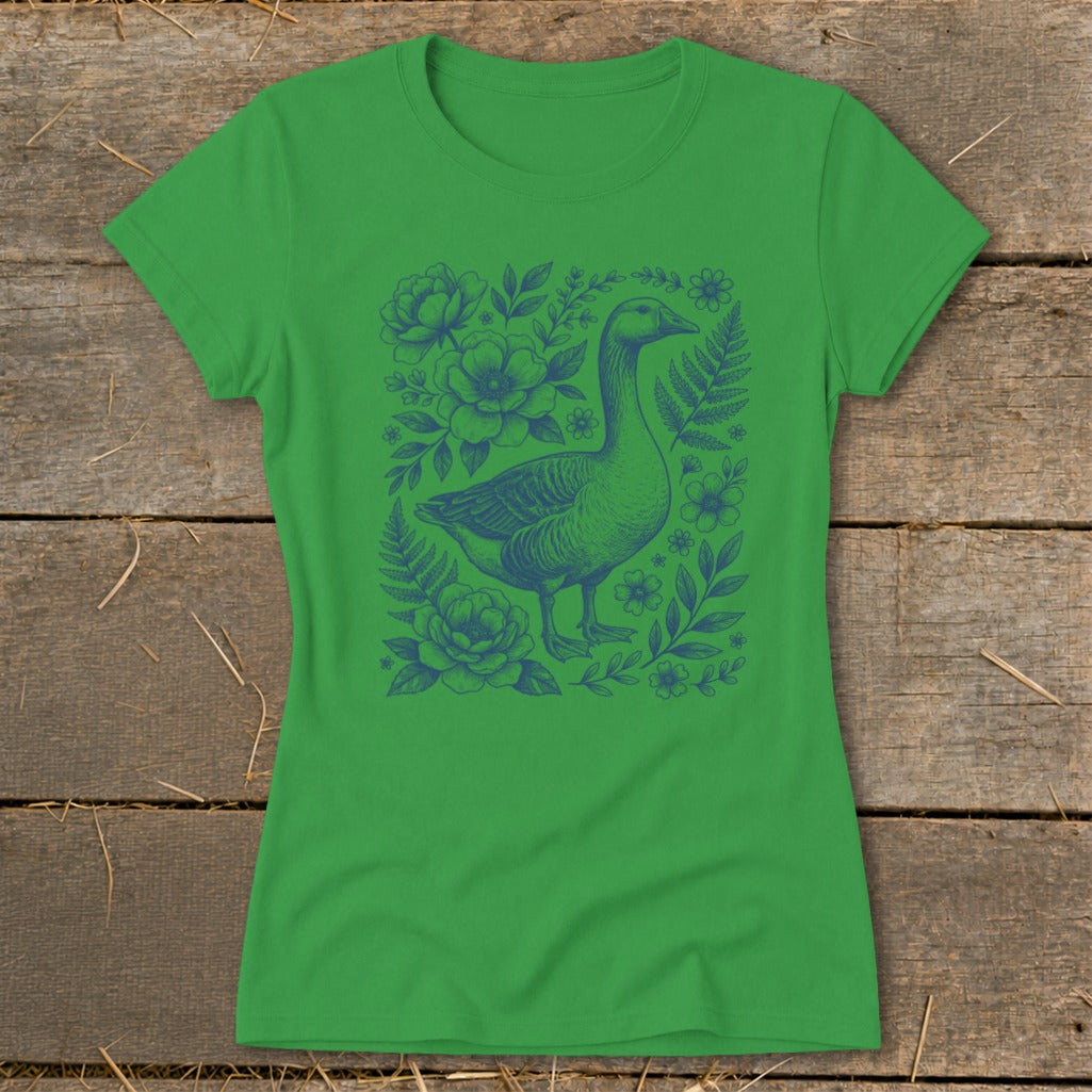 Green t-shirt with a blue goose and floral sketch design on the front.