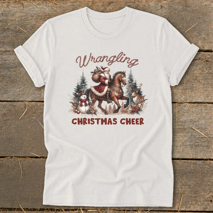 Santa riding a horse with a snowman and deer, text "Wrangling Christmas Cheer".