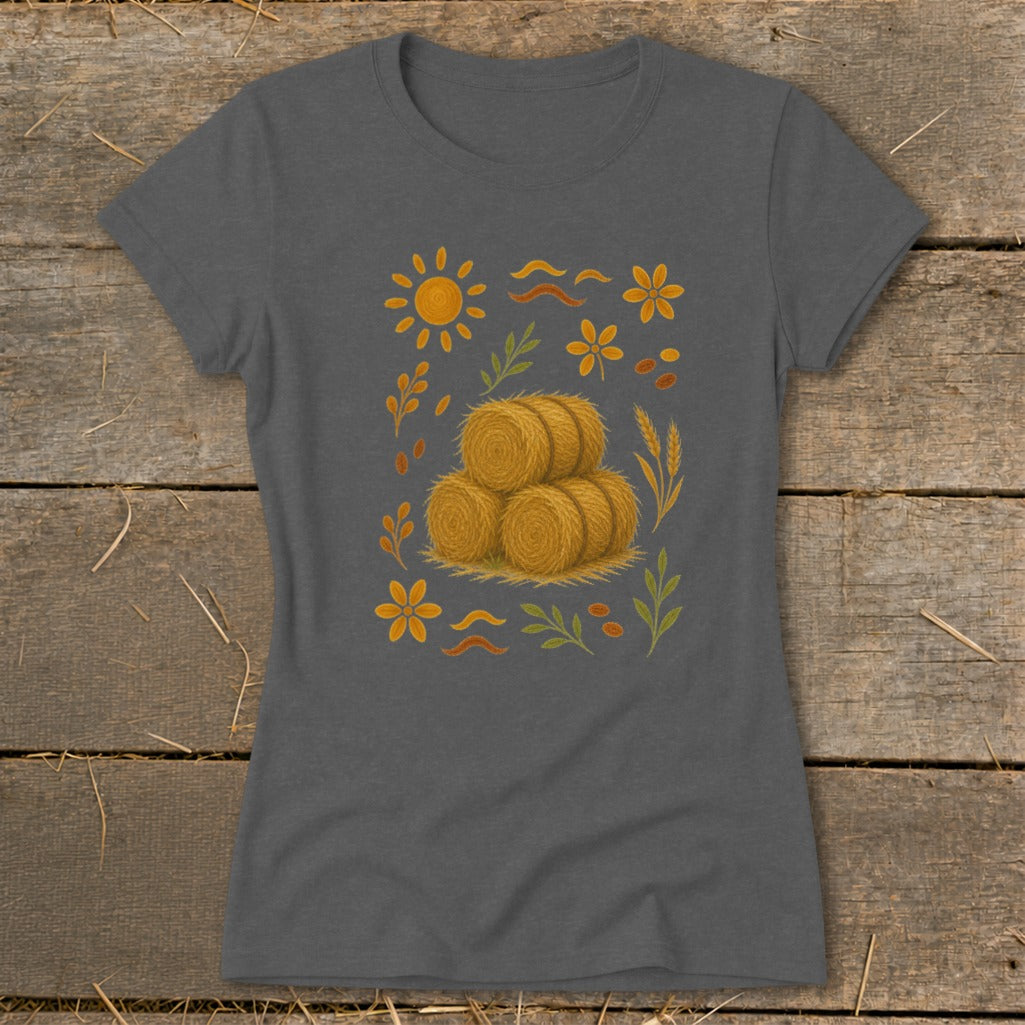 Gray t-shirt with a graphic of stacked hay bales surrounded by autumn foliage.